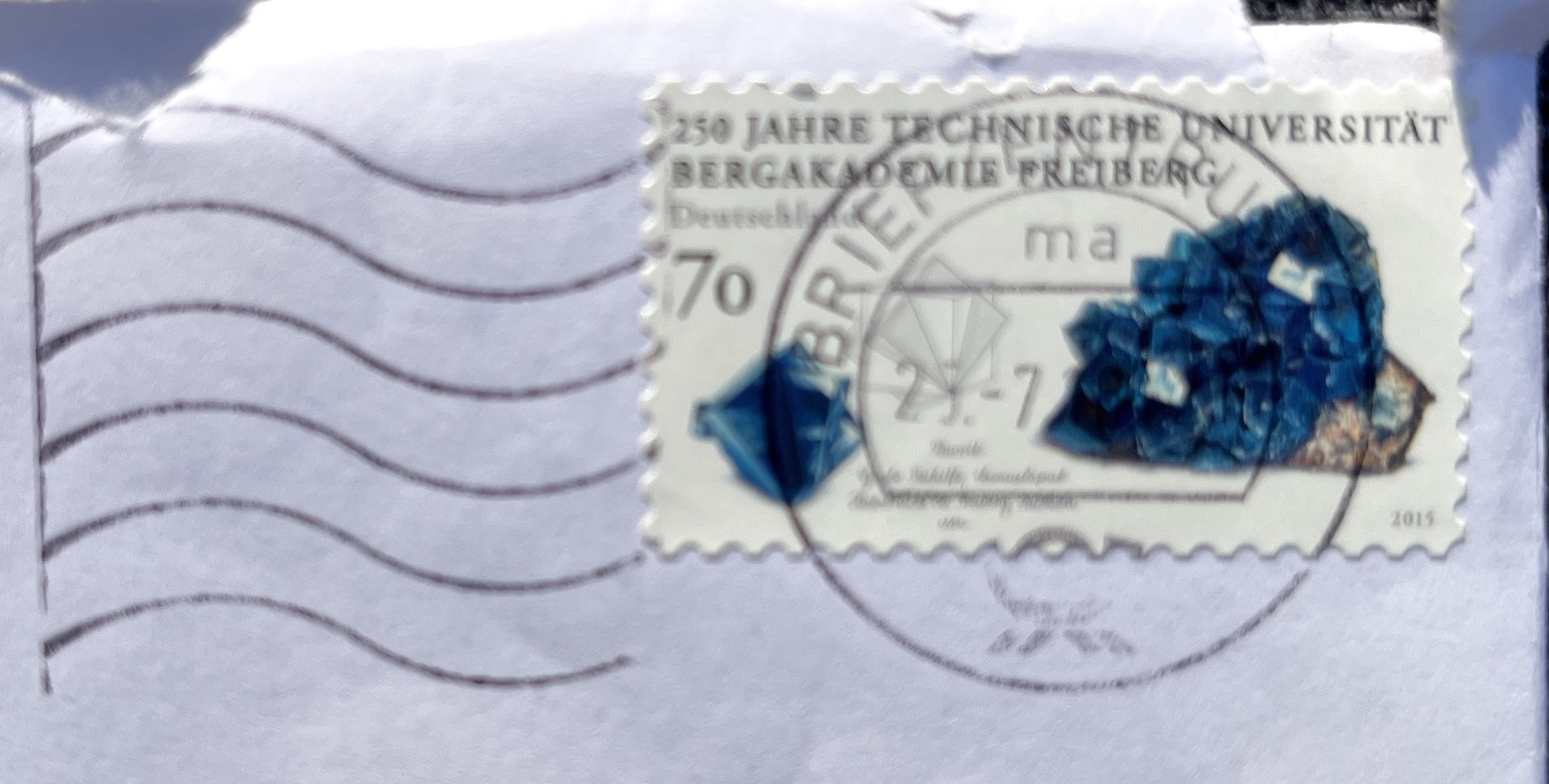 Umschlag: Briefmarke „250 Jahre Technische Universität Bergakademie Freiberg“ und Maschinenstempel des Briefzentrums, Juli 2016