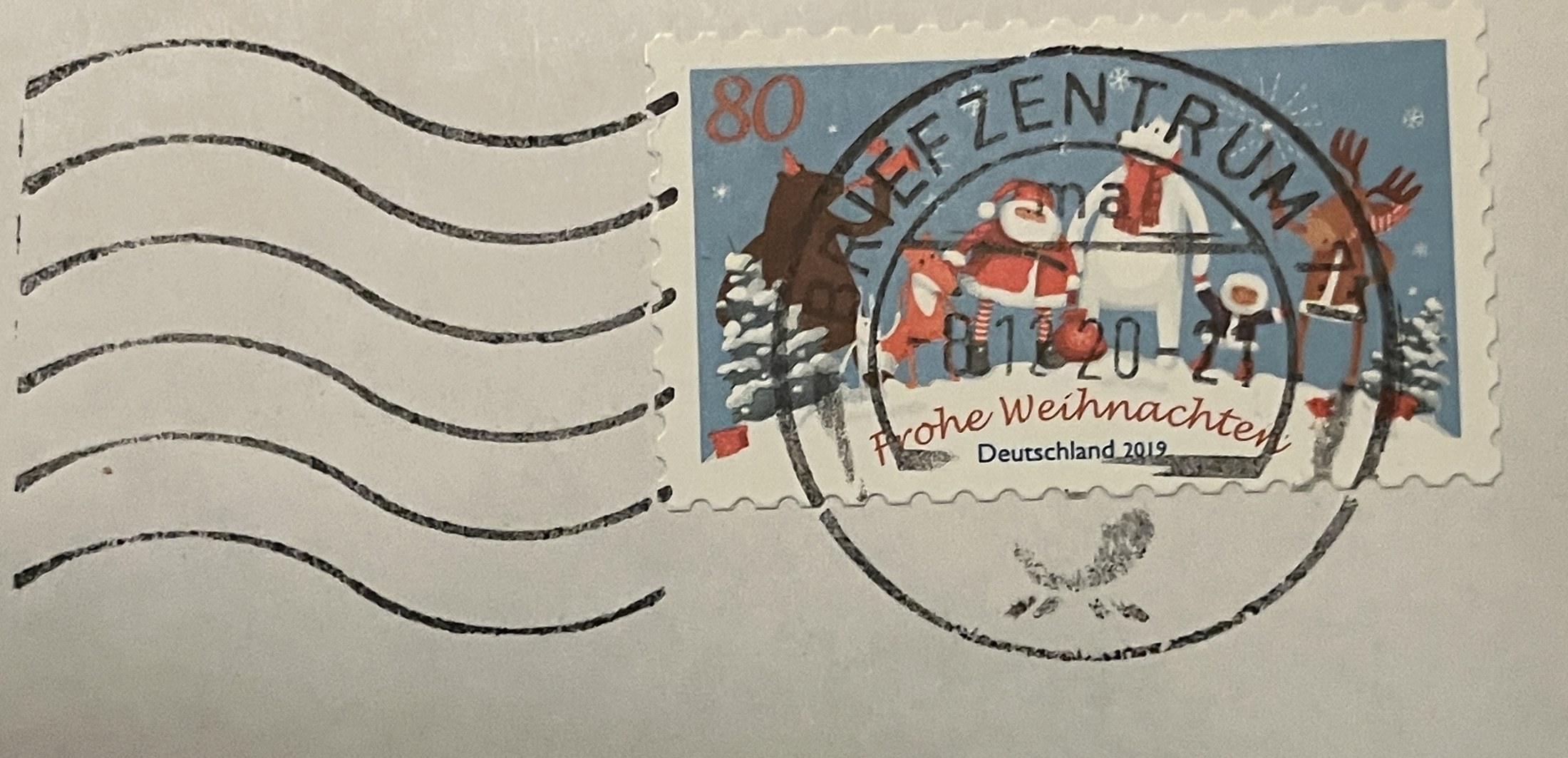 Umschlag: Weihnachtsmarke der Deutschen Post und Maschinenstempel des Briefzentrums vom 8. Dezember
