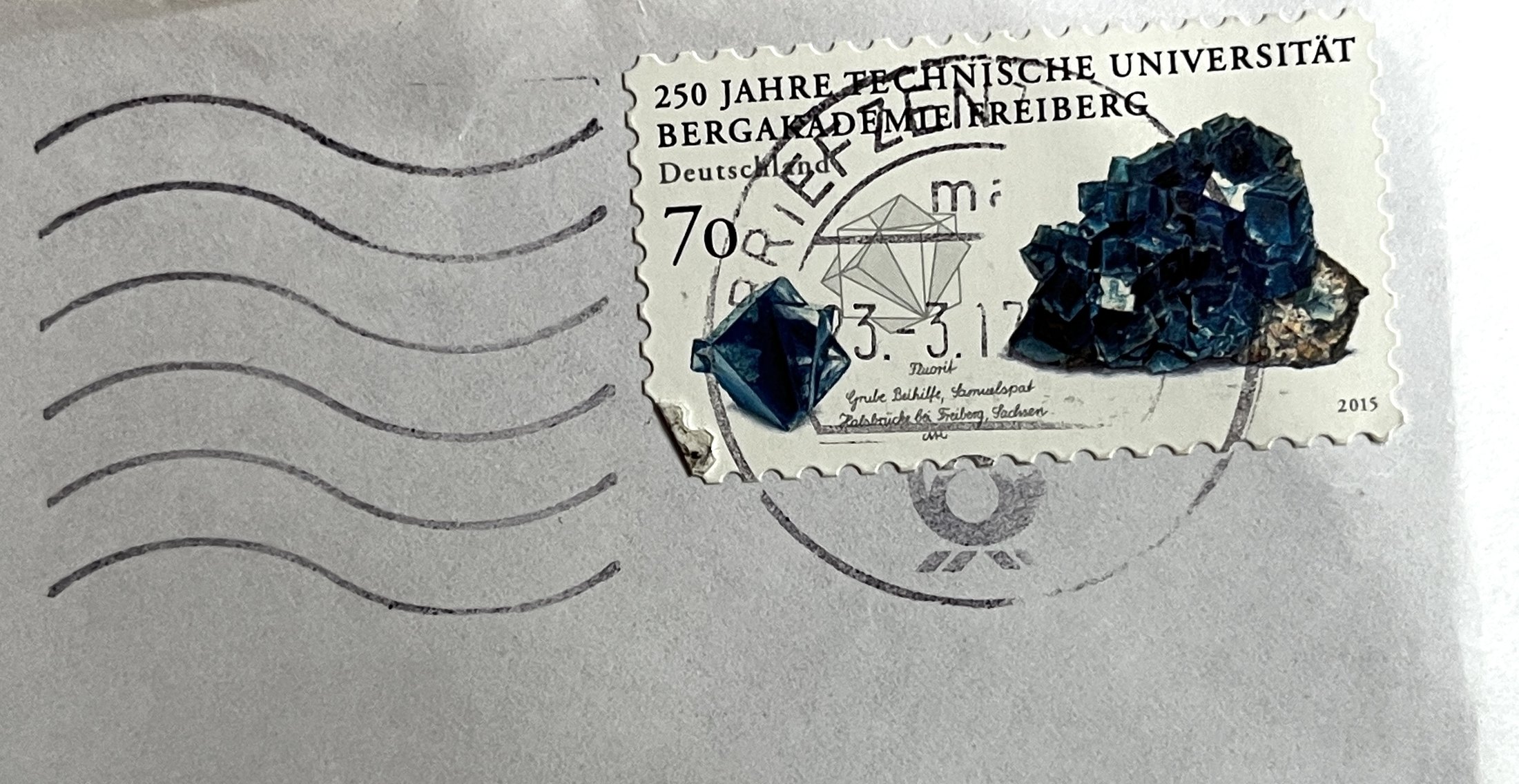Umschlag: Briefmarke (250 Jahre TU Bergakademie Freiberg) und Poststempel vom 23. 3. 2017