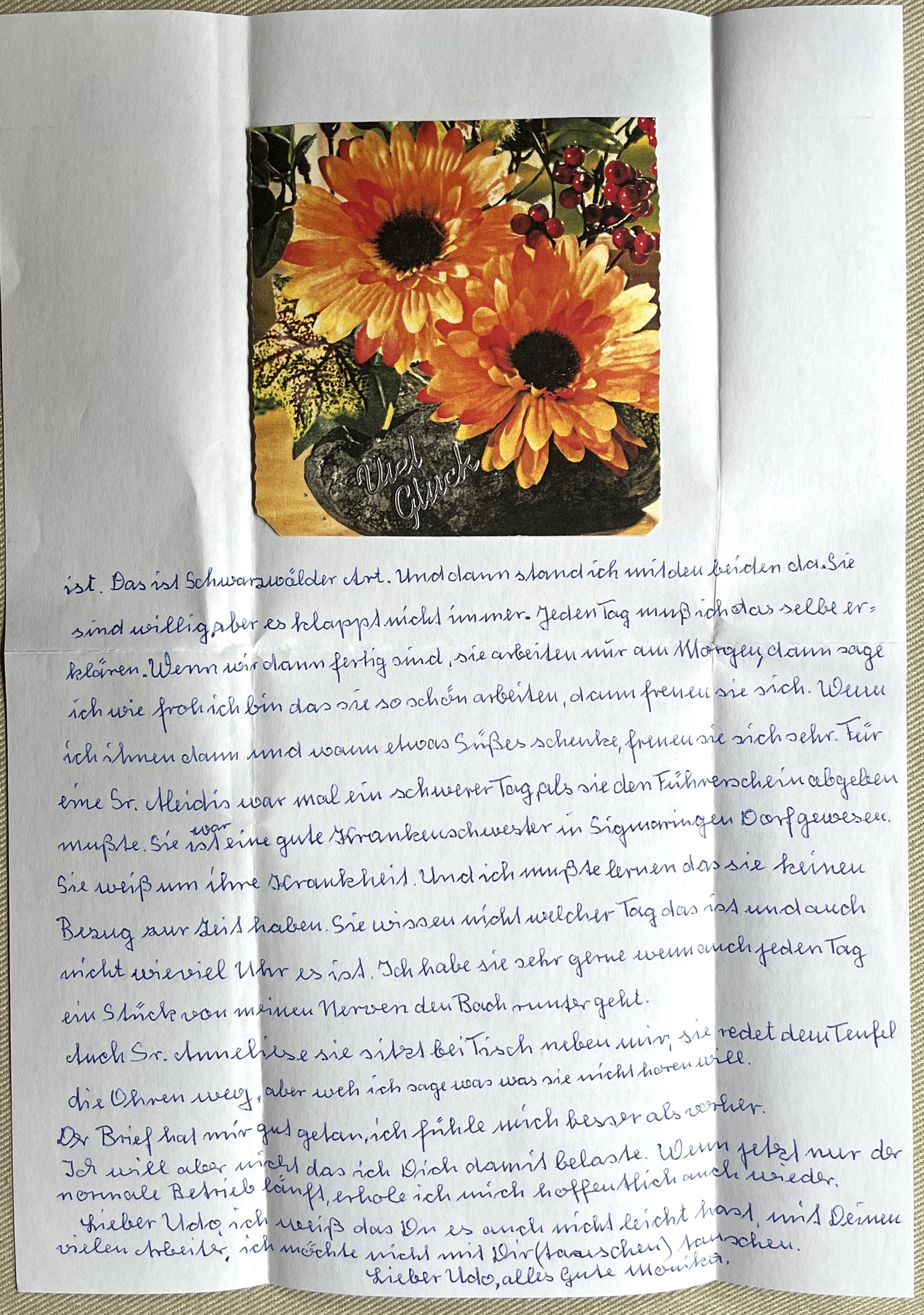 Zweite Seite mit Gerbera-Karte „Viel Glück“ und Schlussgruß