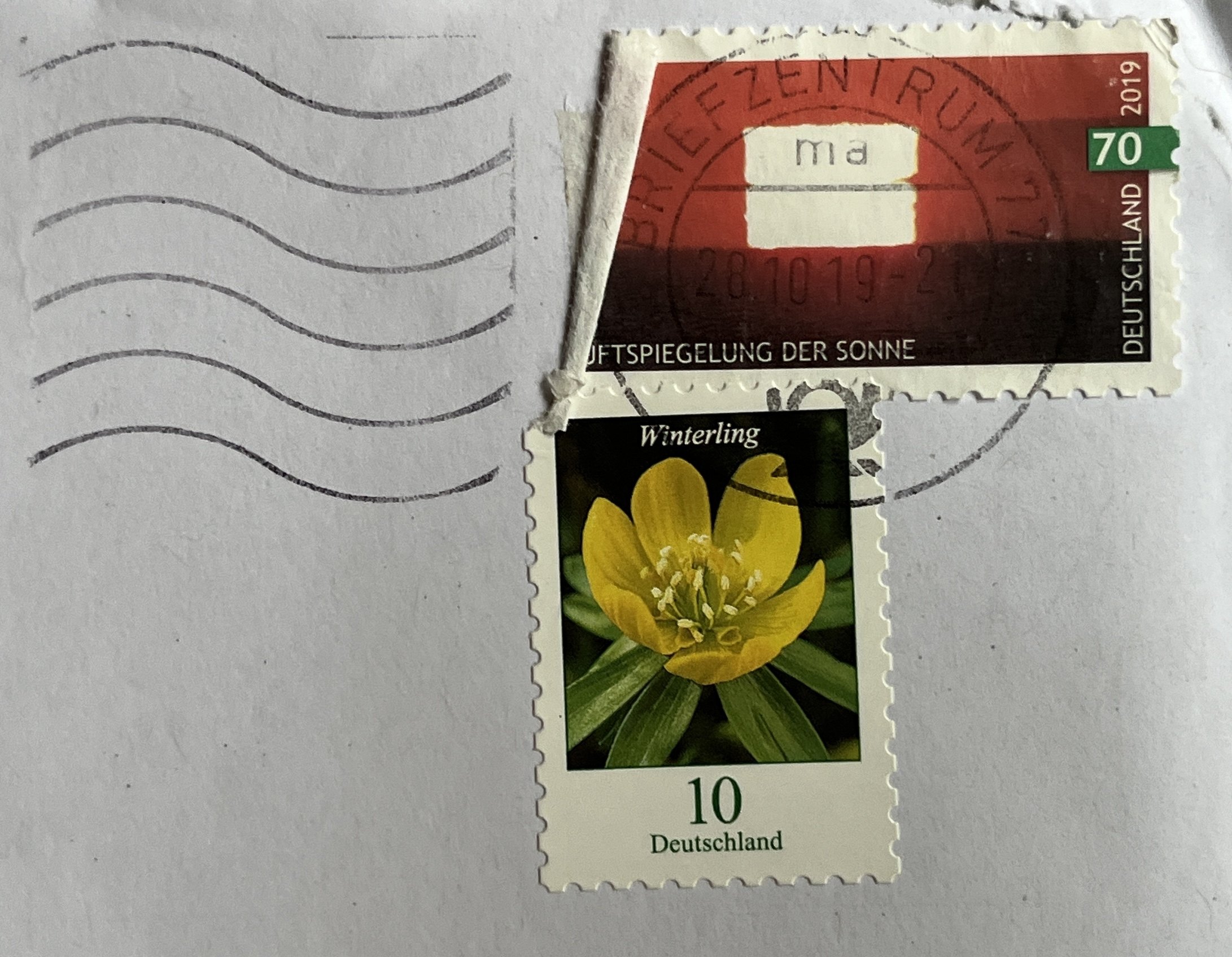 Umschlag: Briefmarken Luftspiegelung der Sonne und Winterling, Poststempel vom 28. 10. 2019